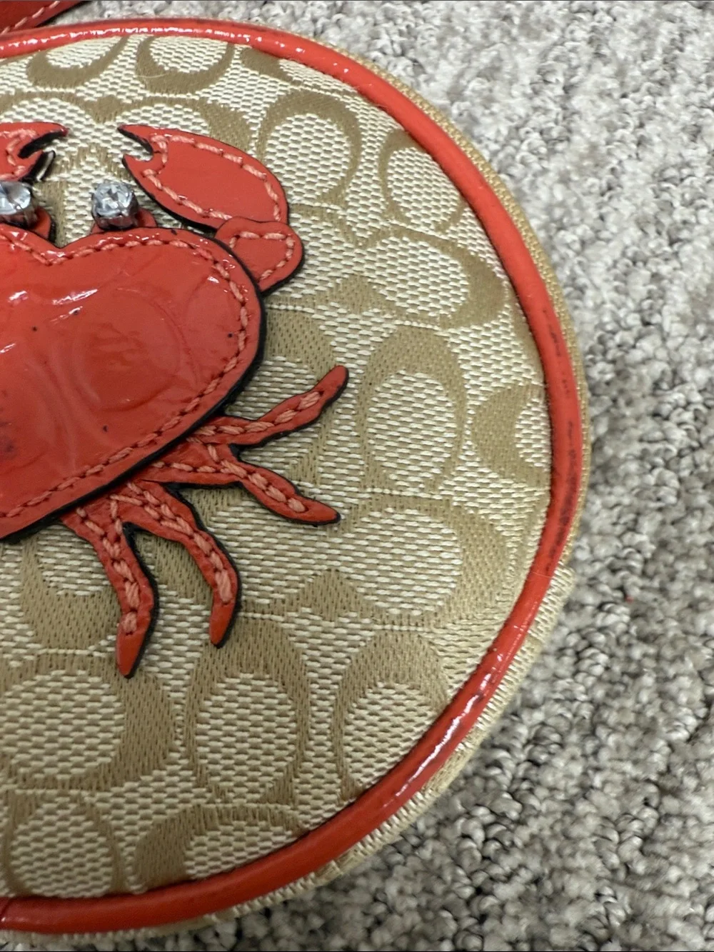 Coach Beige Signature Round Wristlet with Coral Crab 🦀 Appliqué
